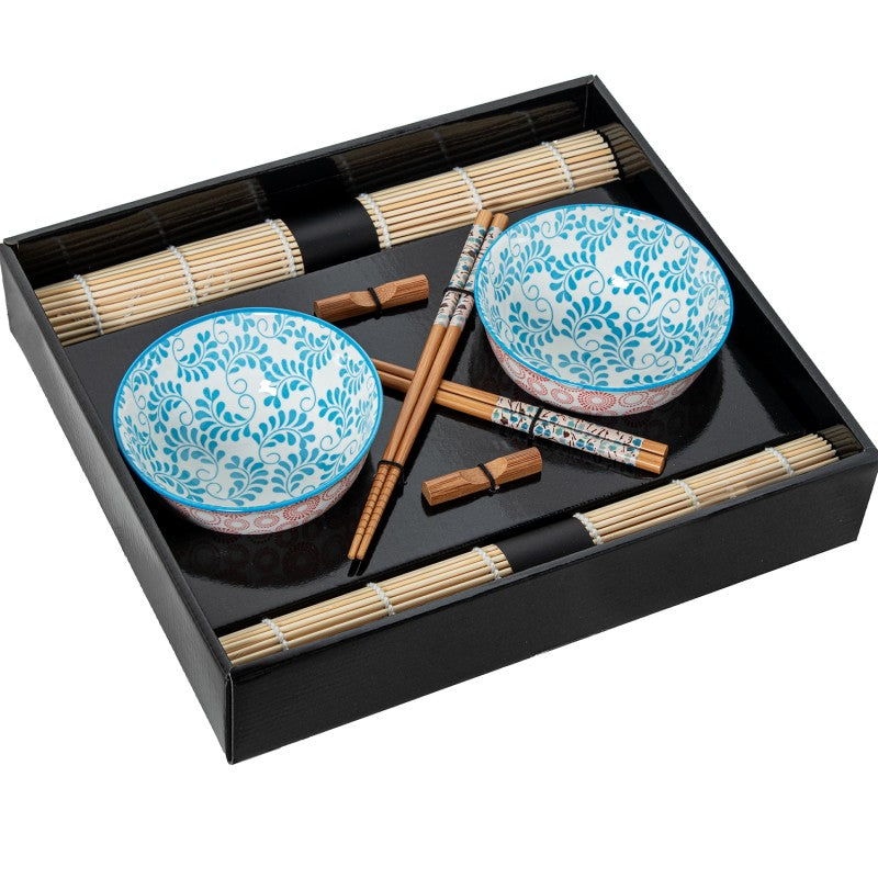 Set completo de 2 cuencos de porcelana con diseño floral azul y borde rosa, junto con palillos y salvamanteles de bambú en caja de presentación