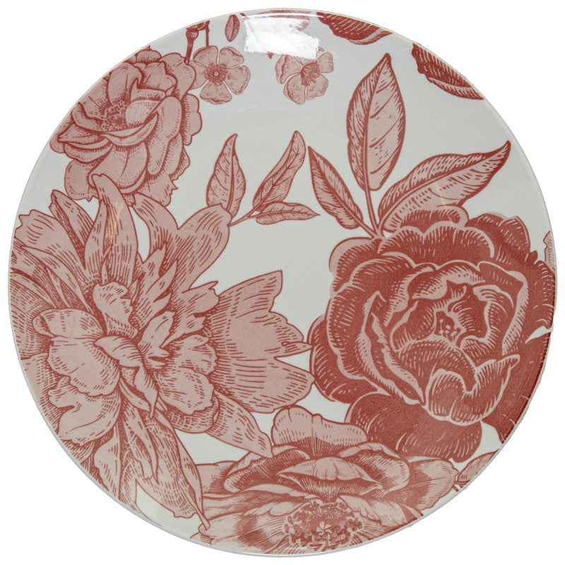 Vista superior de plato llano de porcelana blanca con estampado floral rosa cubriendo toda la superficie