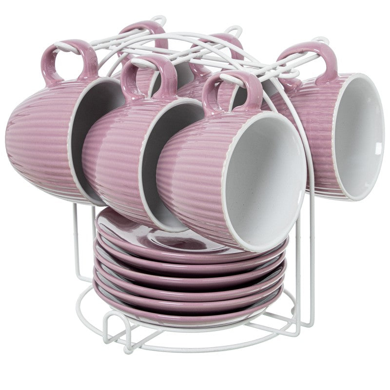 Set de 6 tazas de té rosa palo con platos, organizadas en soporte metálico blanco