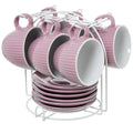 Set de 6 tazas de té rosa palo con platos, organizadas en soporte metálico blanco