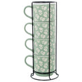 Set de 4 mugs de cerámica verde con estampado floral blanco, apilados en soporte metálico negro