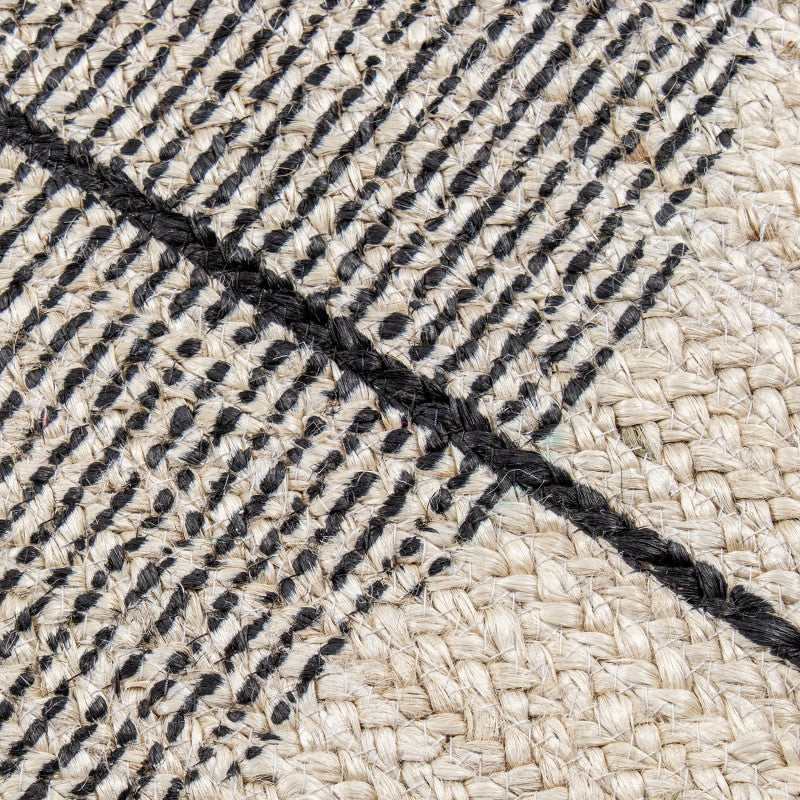 Detalle del tejido de yute con líneas diagonales negras