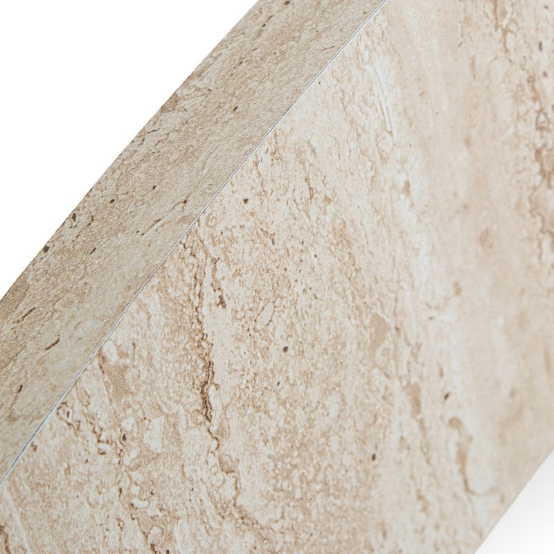 Detalle de la textura del papel travertino que recubre el marco de madera