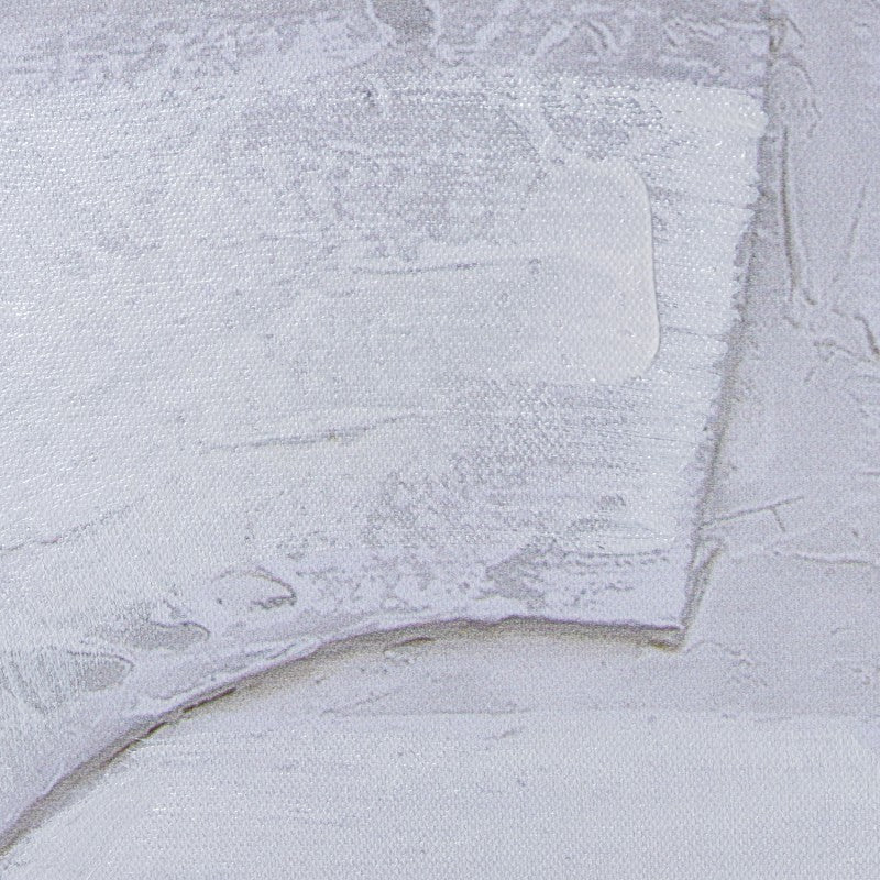 Primer plano de las formas geométricas en relieve blanco del lienzo